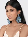 Boucle-Oreille-Feuille-portée.webp