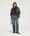 Momoni - Blouson Lond Coat en Cuir Noir porté.webp